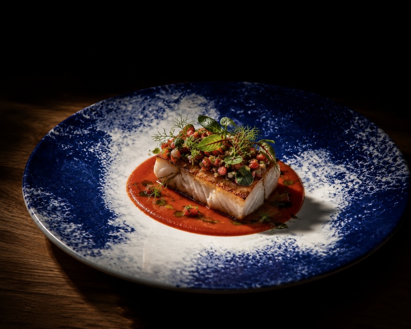 Fish dish on a blue plate — PAYOTE signature creation